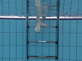 Aqua girl Andrejka underwater stripping and swimming