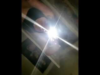 BananaSmashLee in the bathroom mirror teases with tongue
