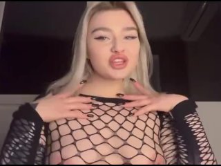Big breasts through the mesh