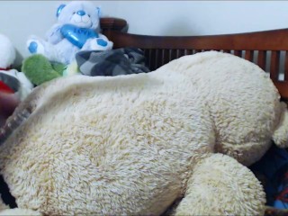 Fucking a teddybear with a condom