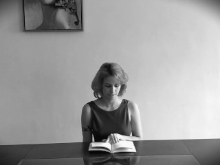 Hysterically reading Marquis de Sade while sitting on a vibrator