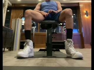 JockDad87 jerks and shoots his cum in the hotel gym
