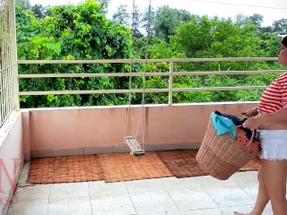 Naked laundry. The maid is drying clothes in the laundry.