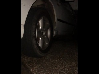 Naughty girl piss on car tire (Busting)