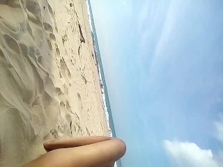 On the seashore public masturbating a Hot beautiful venezuelan redhead
