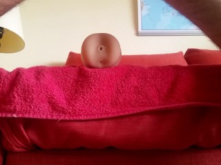 Pounding a fake pussy and moaning loud