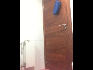 Stepbrother spying while pissing