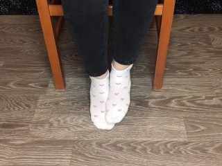 Student girl in white socks show foot and socks pov